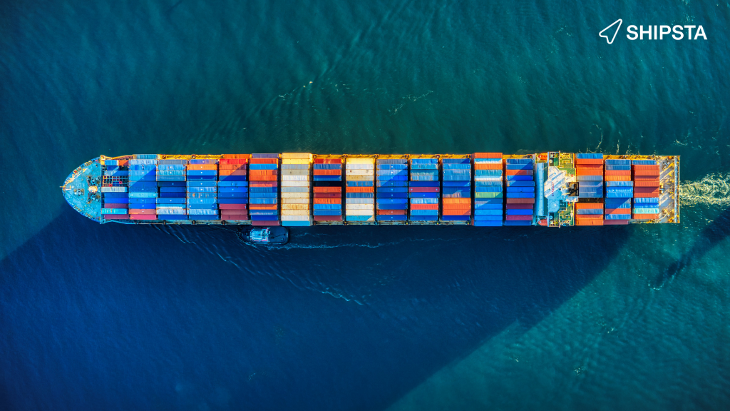 Container ship sailing on smooth seas